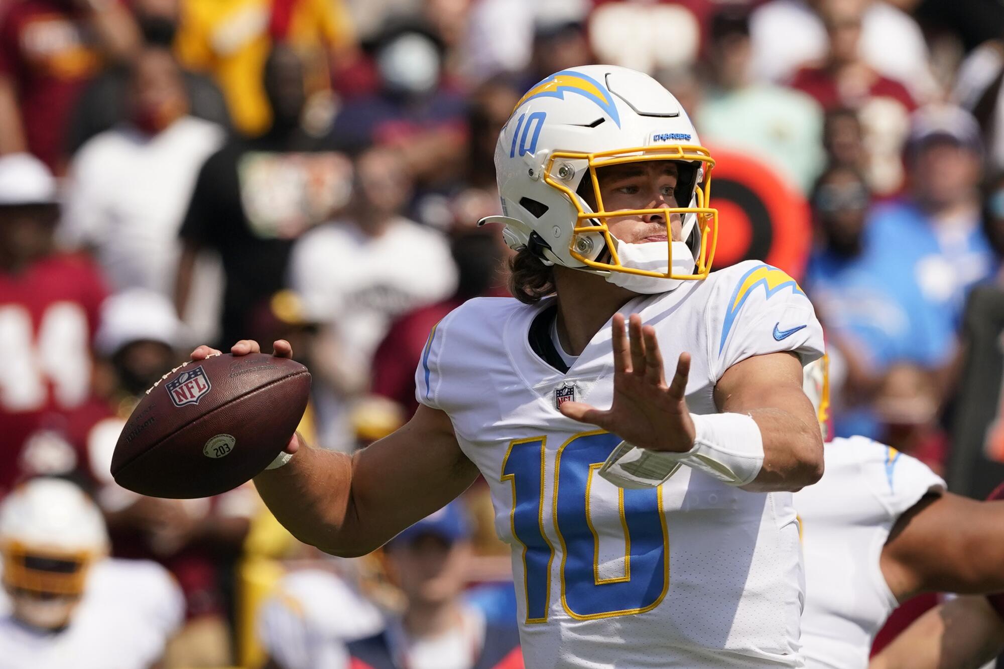 Chargers quarterback Justin Herbert passes against Washington in the first half of Sunday's win.