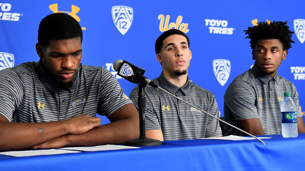 UCLA basketball players (from left) Cody Riley, LiAngelo Ball and Jalen Hill address the media on Wednesday.