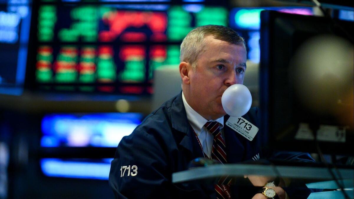 A gum-chewing trader ahead of the closing bell on the floor of the New York Stock Exchange on Jan. 29, 2019.