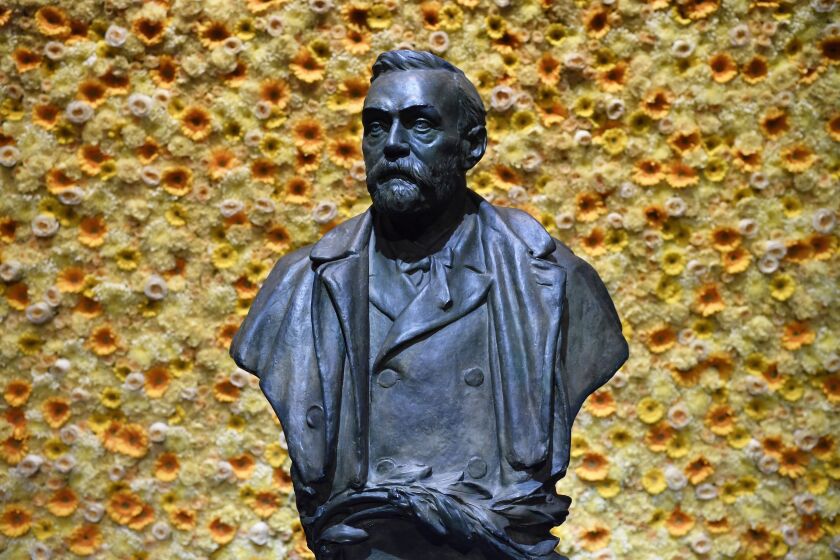 FILE - In this Monday, Dec. 10, 2018 file photo, a bust of the Nobel Prize founder, Alfred Nobel on display at the Concert Hall during the Nobel Prize award ceremony in Stockholm. This year’s Nobel season approaches as Russia’s invasion of Ukraine has shattered decades of almost uninterrupted peace in Europe and raised the risks of a nuclear disaster. The famously secretive Nobel Committee never leaks or hints who will win its prizes for medicine, physics, chemistry, literature, economics or peace. So it is anyone’s guess who might win the awards that will be announced starting next Monday, Oct. 3, 2022. (Henrik Montgomery/Pool Photo via AP, File)