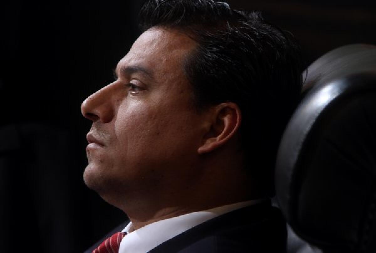 Los Angeles City Councilman Jose Huizar listens during a council meeting in 2012. His youngest daughter, Aviana, has been diagnosed with leukemia.