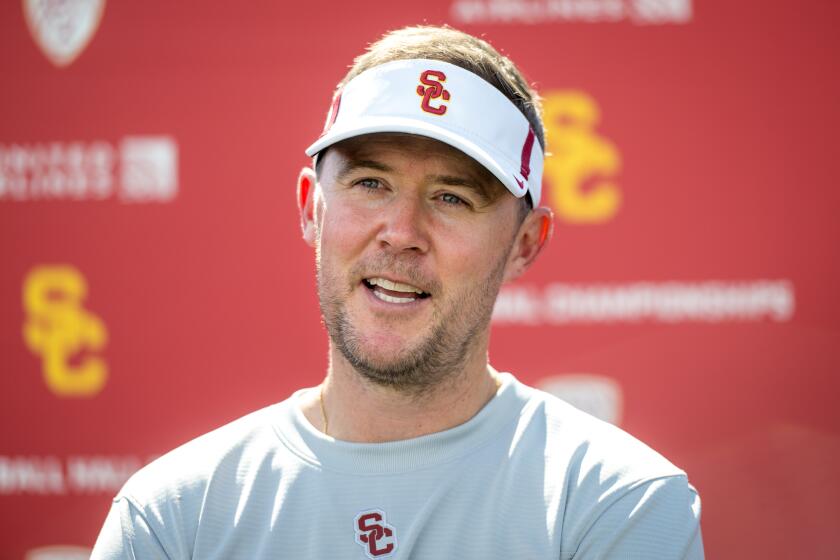 USC football coach Lincoln Riley talks with the media after practice during the first day of fall training camp Aug. 5, 2022.