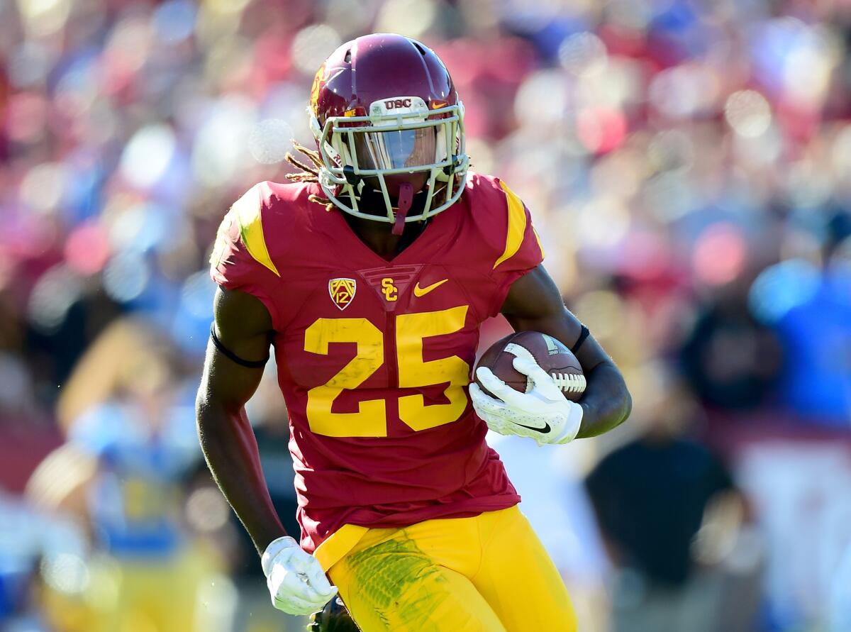 Trojans running back Ronald Jones II looks for room to run against the Bruins in the first half last Saturday.