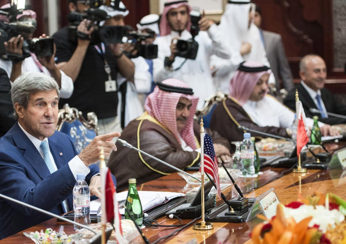 U.S. Secretary of State John Kerry speaks at a meeting of the Persian Gulf Arab region in Jidda, Saudi Arabia, on Thursday to marshal support for battling Islamic State militants.