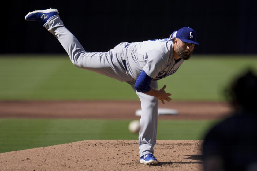 Los Angeles Dodgers starting pitcher Lance Lynn works against a San Diego Padres batter.