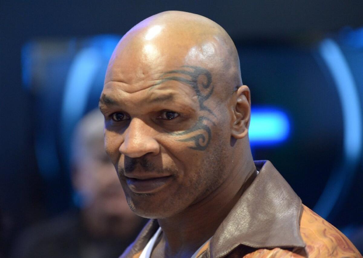 Mike Tyson is being called a hero after he came to the aid of an injured motorcyclist in Las Vegas.