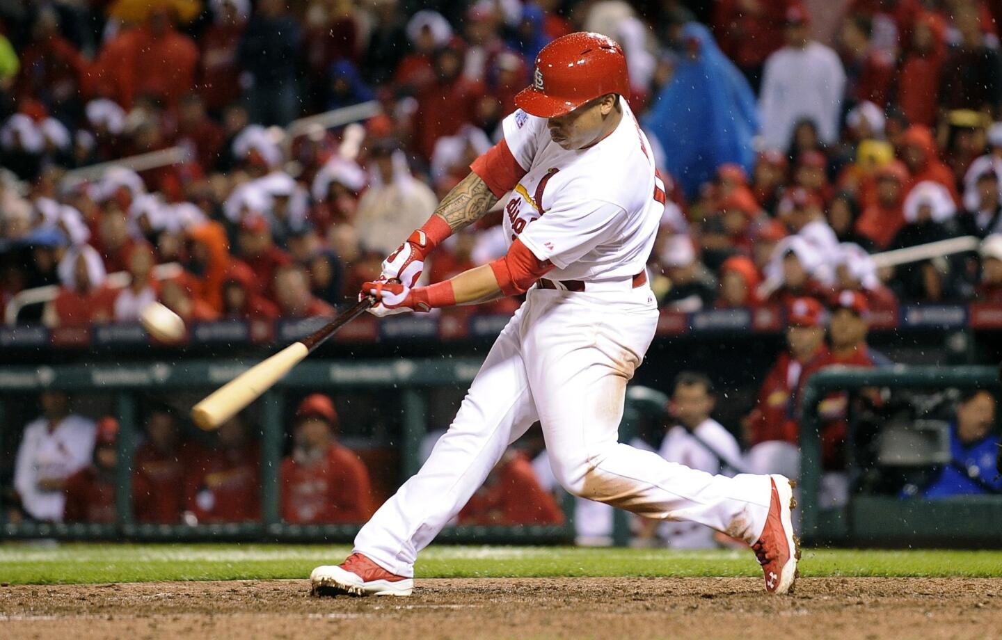 St. Louis Cardinals second baseman Kolten Wong hits a two-run home run off Dodgers reliever Scott Elbert (not pictured) during the seventh inning of a 3-1 win over the Dodgers in Game 3 of the National League division series Monday.