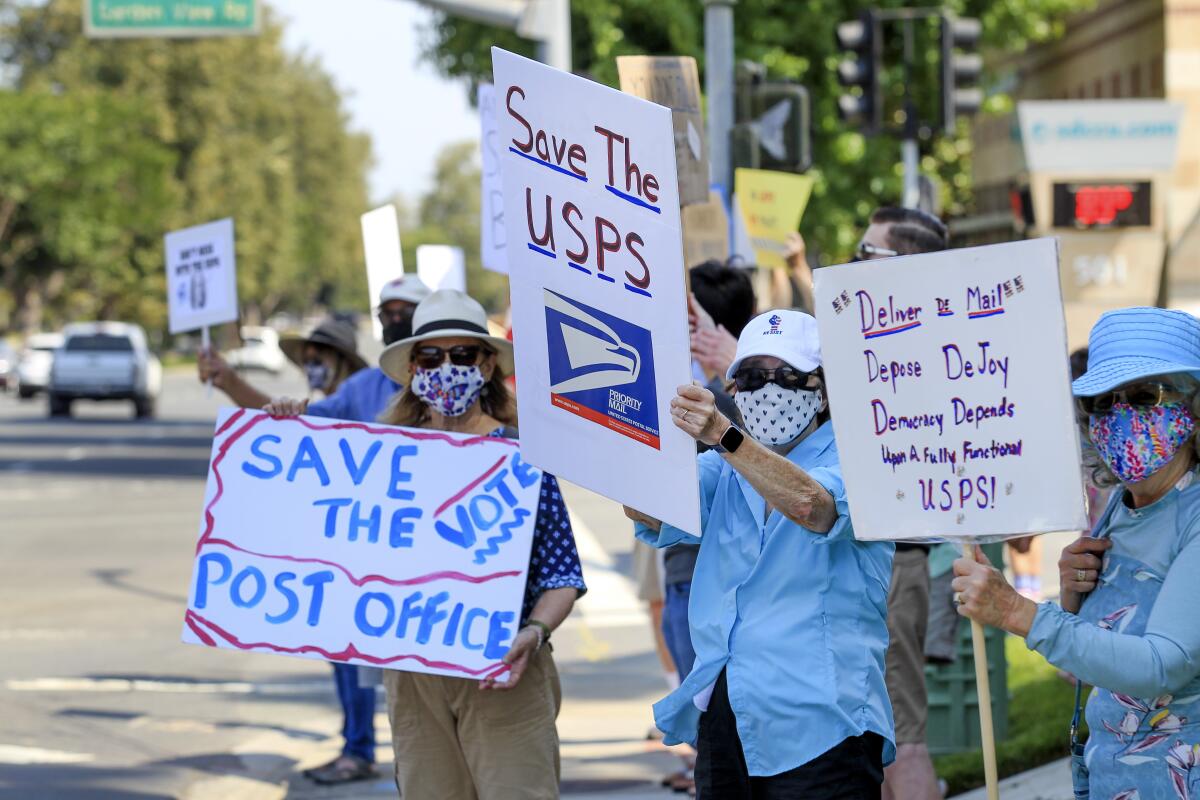 Protesters gathering in support of the USPS, Saturday,