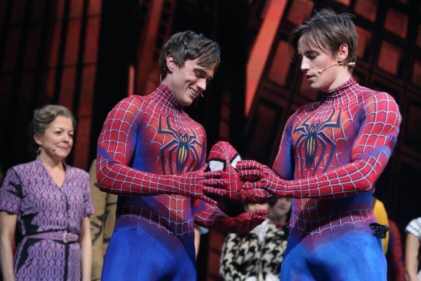 Reeve Carney, right, introduces Justin Matthew Sargent as Broadway's new Spider-Man at the Foxwoods Theatre in New York.