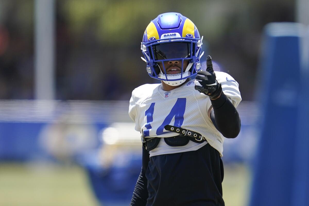 Rams cornerback Decobie Durant gestures to a coach during camp.