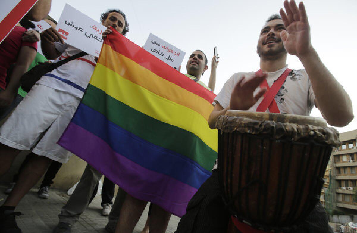A protester plays a drum at an anti-homophobia rally in the Lebanese capital, Beirut, in April.