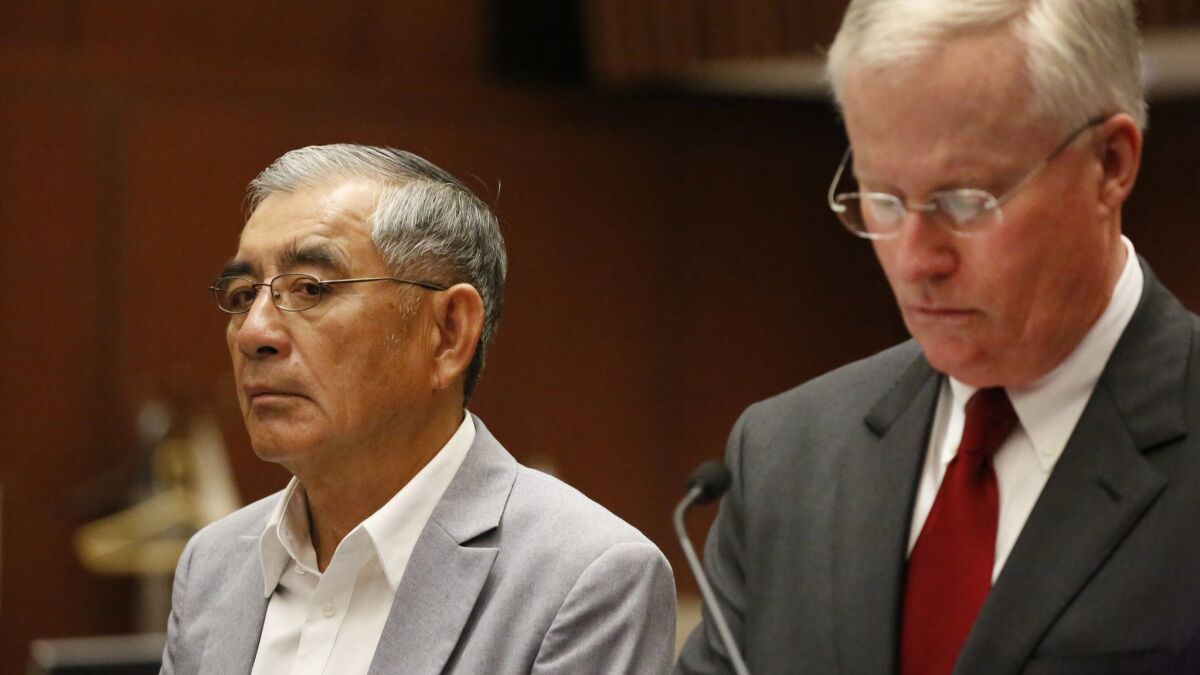 Developer Samuel Leung, left, with his lawyer, Daniel Nixon, in court in 2018.