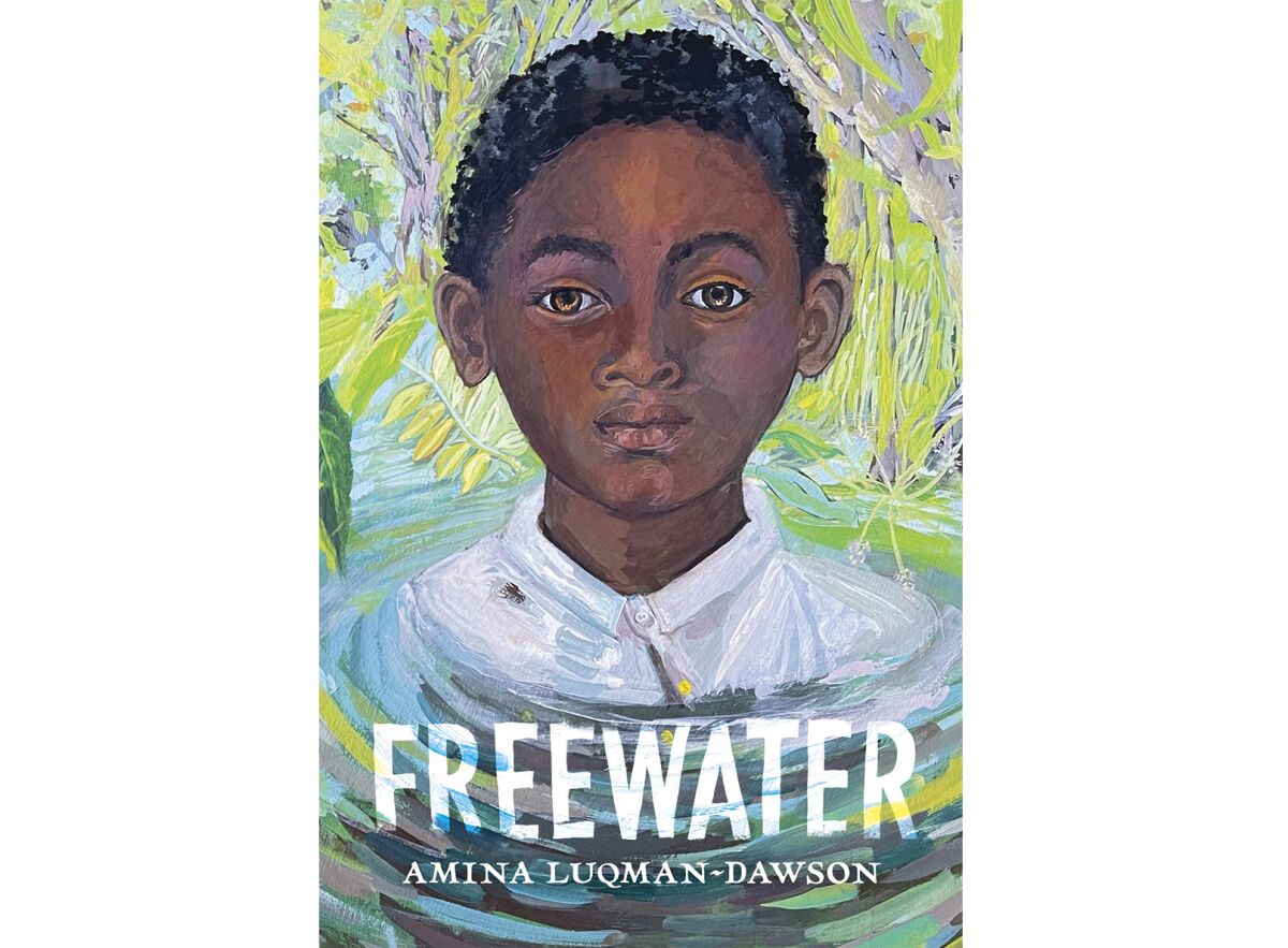 This cover image released by Little, Brown for Young Readers shows "Freewater" by Amina Luqman-Dawson, winner of the John Newbery Medal for the year’s best children’s book. Luqman-Dawson also won the Coretta Scott King prize for best children's story by a Black author. (Little, Brown for Young Readers via AP)