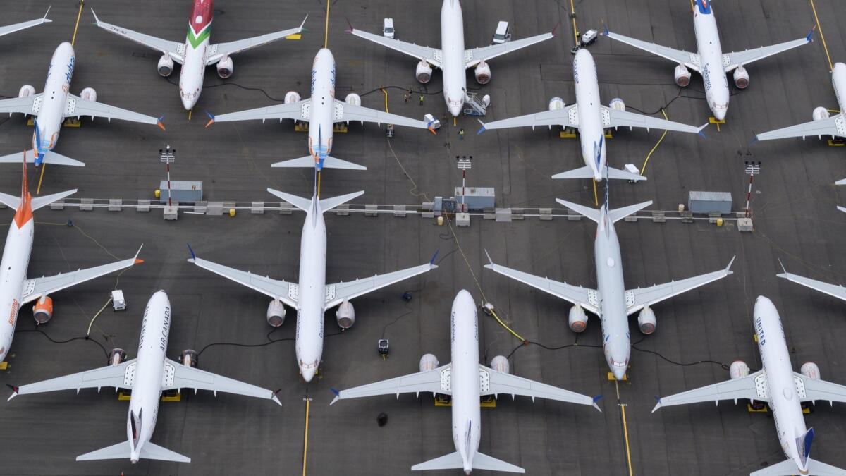 Boeing 737 Max airplanes are stored in an area adjacent to Boeing Field in Seattle.