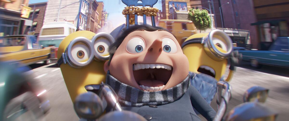 From left, Kevin, Gru (voiced by Steve Carell) and Stuart in a scene from "Minions: The Rise of Gru."
