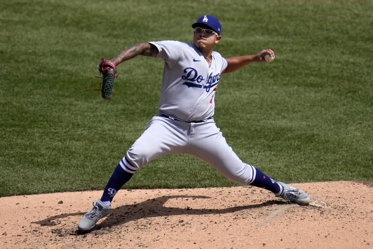 Dodgers left-hander Julio Urías pitches in the third inning against the Pittsburgh Pirates.