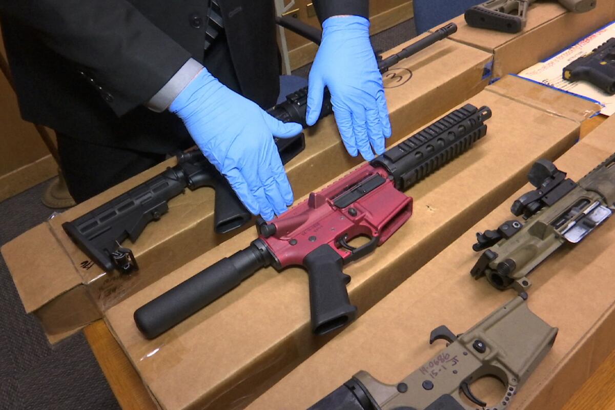FILE - "Ghost guns" are displayed at the headquarters of the San Francisco Police Department in San Francisco, Nov. 27, 2019. Two gun parts manufacturers have agreed to halt sales of their products in Philadelphia and elsewhere in Pennsylvania, city officials said Thursday, April 11, 2024, announcing a settlement of their lawsuit against the companies. Philadelphia filed suit against Polymer80 and JSD Supply in July 2023, accusing the manufacturers of perpetuating gun violence in the city by manufacturing and selling untraceable, self-manufactured weapons commonly known as “ghost guns.” (AP Photo/Haven Daley, File)