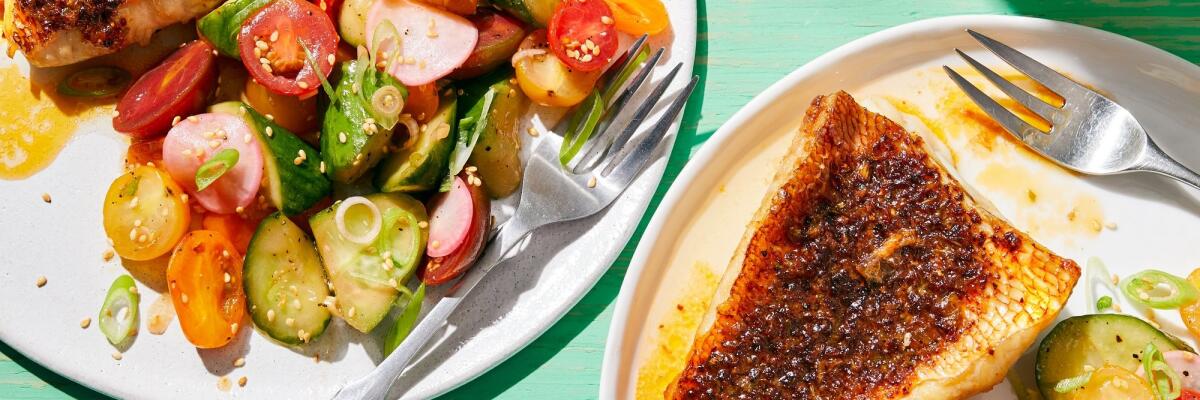 Blackened Red Snapper With Crunchy Pickled Tomatoes, served with pickled salad.