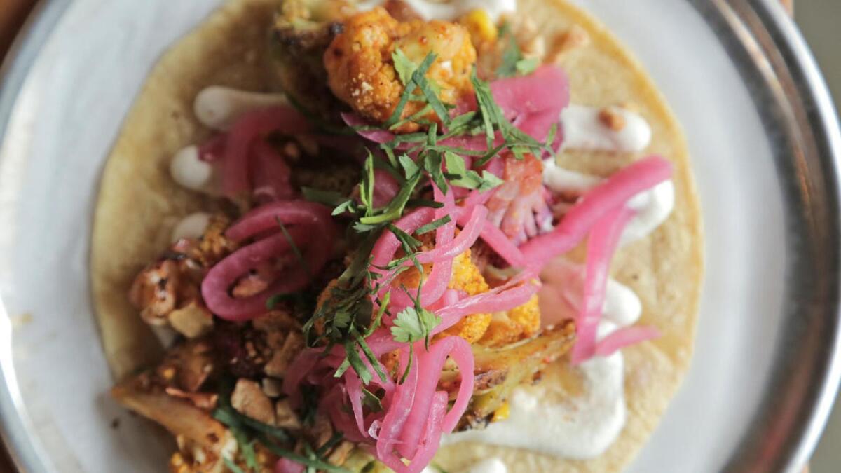 The rainbow cauliflower taco with grilled corn and cashew puree is a vegan-friendly menu item at Trejo's Cantina in Hollywood.