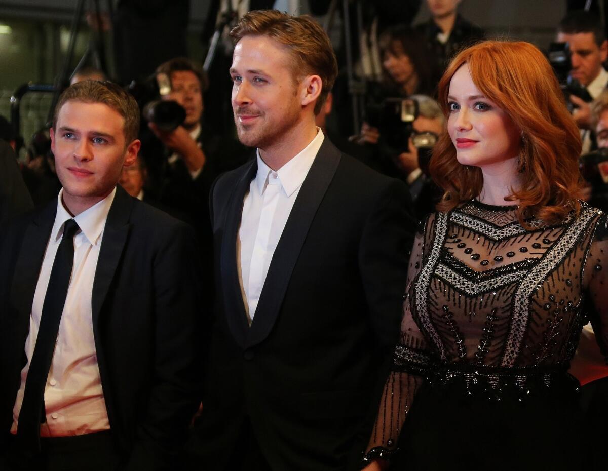 Actors Iain De Caestecker, left, Ryan Gosling and Christina Hendricks arrive on May 20 for the screening of "Lost River" in Cannes.