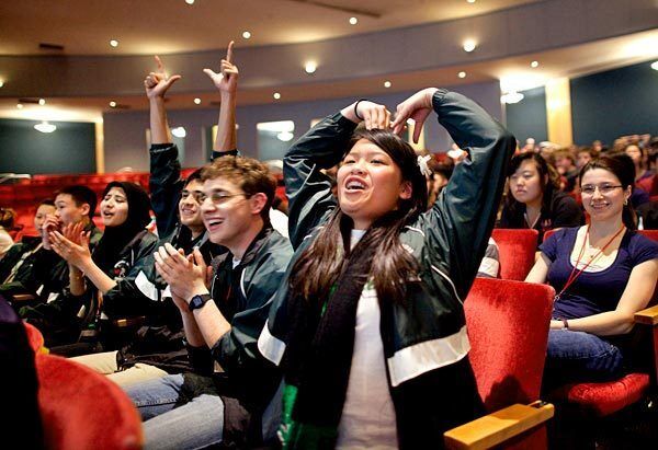 Granada Hills Charter High School's Kimberly Ly cheers on her teammates at the Super Quiz at the 2012 National Academic Decathlon in Albuquerque on Friday.
