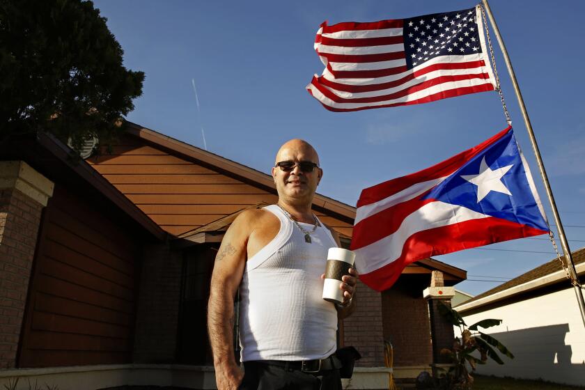Luis Olivera, of Kissimmee, Fla., is proud of his Puerto Rican heritage.