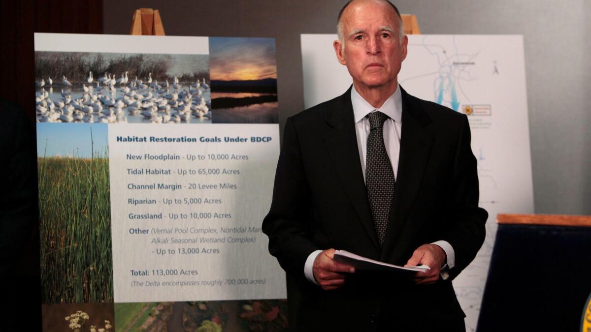 Gov. Jerry Brown before a 2012 news conference to announce plans to build a tunnel system to move water from the Sacramento-San Joaquin River Delta to farmland and cities.