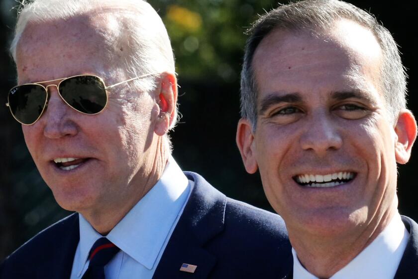 LOS ANGELES, CALIFORNIA - JANUARY 10: Democratic presidential candidate former U.S. Vice President Joe Biden (L) walks with Los Angeles Mayor Eric Garcetti at a campaign event at United Firefighters of Los Angeles City on January 10, 2020 in Los Angeles, California. Garcetti endorsed Biden yesterday. (Photo by Mario Tama/Getty Images)