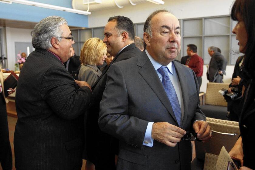 Ron, left, and Tom Calderon, right, face charges of accepting bribes and money laundering, respectively. Attorneys for the brothers have denied the allegations.