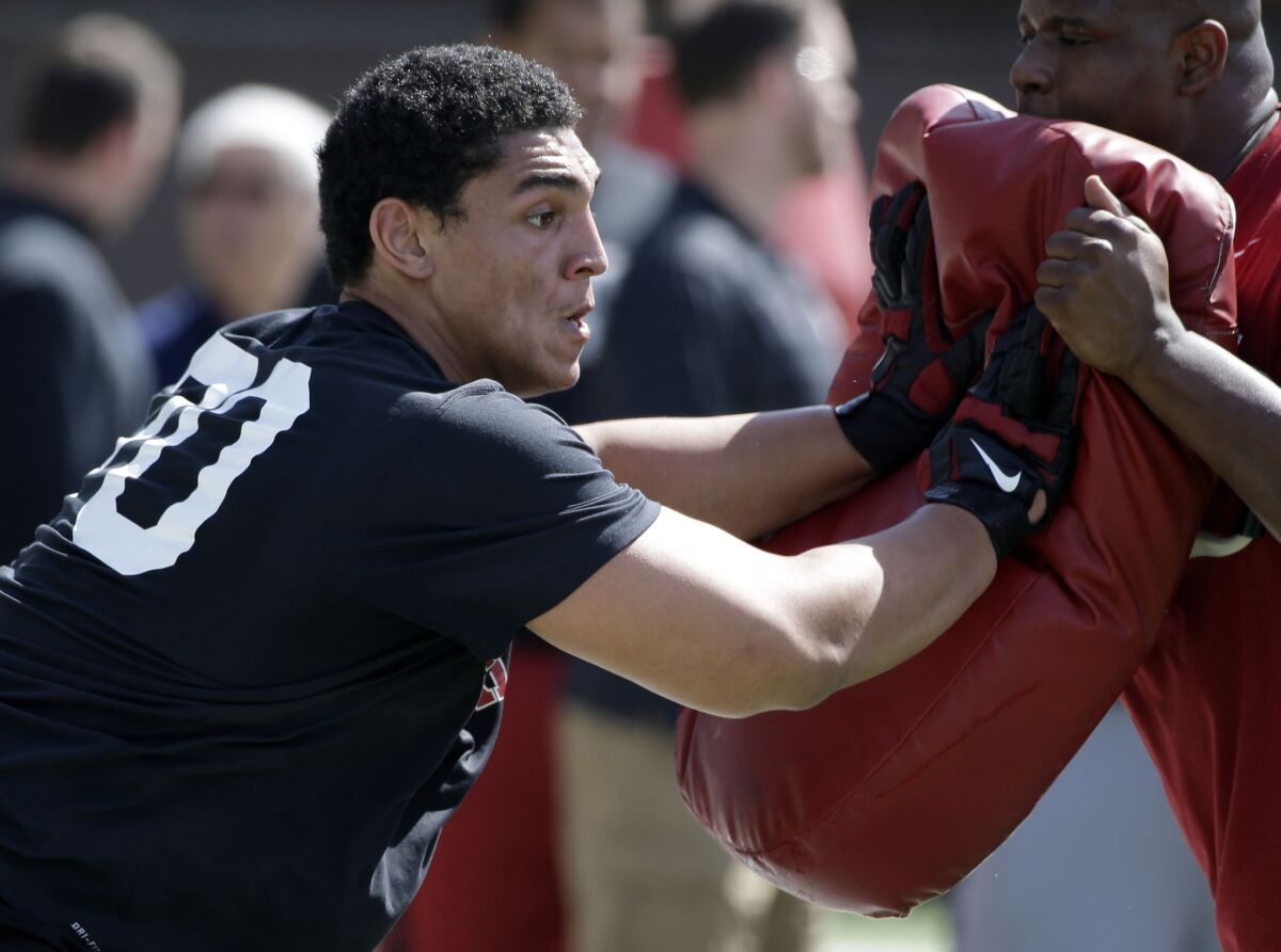 Offensive lineman Andrus Peat participates in a drill during Stanford's pro day on March 19.