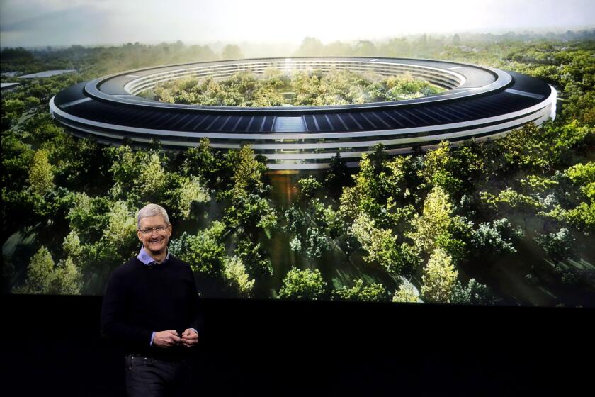 Apple CEO Tim Cook, discusses the new Apple campus at an event to announce new products at Apple headquarters Monday, March 21, 2016, in Cupertino, Calif. (AP Photo/Marcio Jose Sanchez)