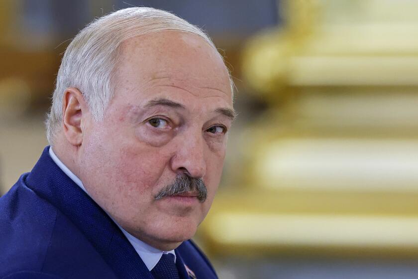 FILE - Belarusian President Alexander Lukashenko attends a meeting of the Supreme Eurasian Economic Council of the Eurasian Economic Union at the Kremlin in Moscow, Russia, on May 8, 2024. Dozens of Nobel Prize laureates are calling in an open letter on Belarus' authoritarian President Alexander Lukashenko to free all the country's political prisoners, following the release this month of 18 who are seriously ill. (Evgenia Novozhenina/Pool Photo via AP, File)
