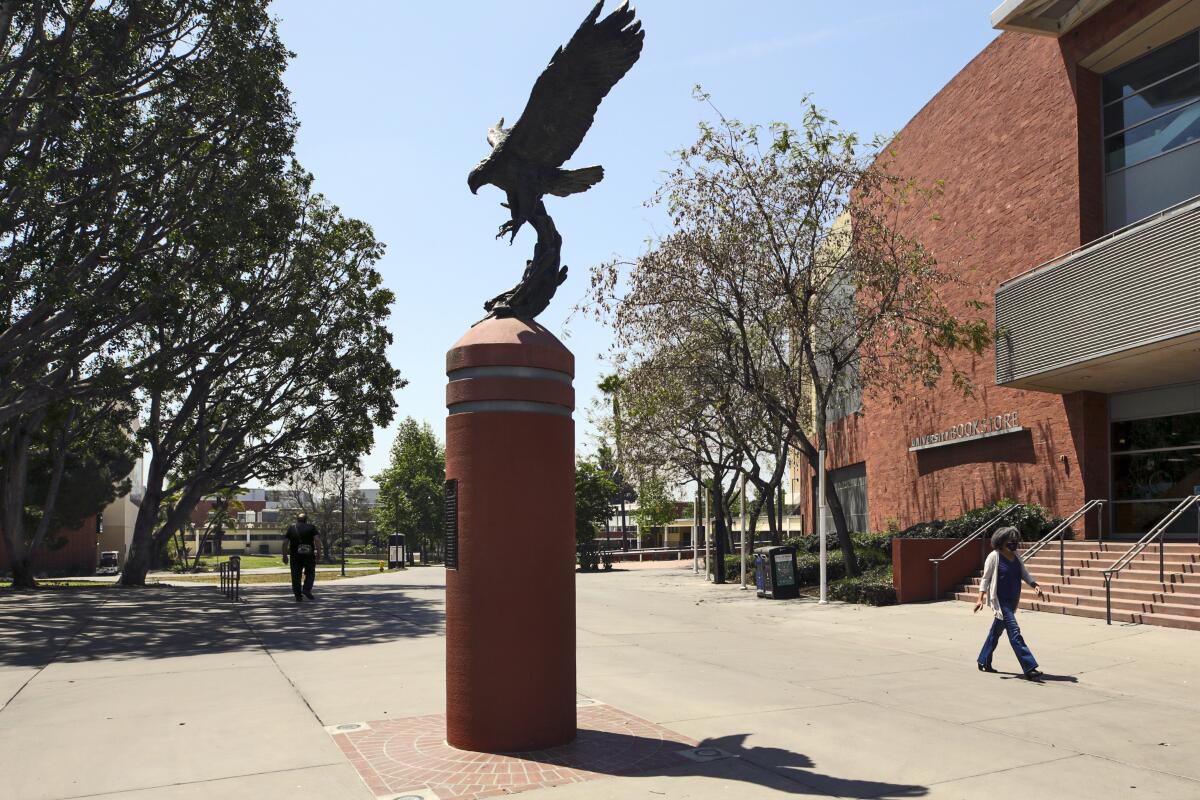A plaza at Cal State Los Angeles with statue of an eagle. 