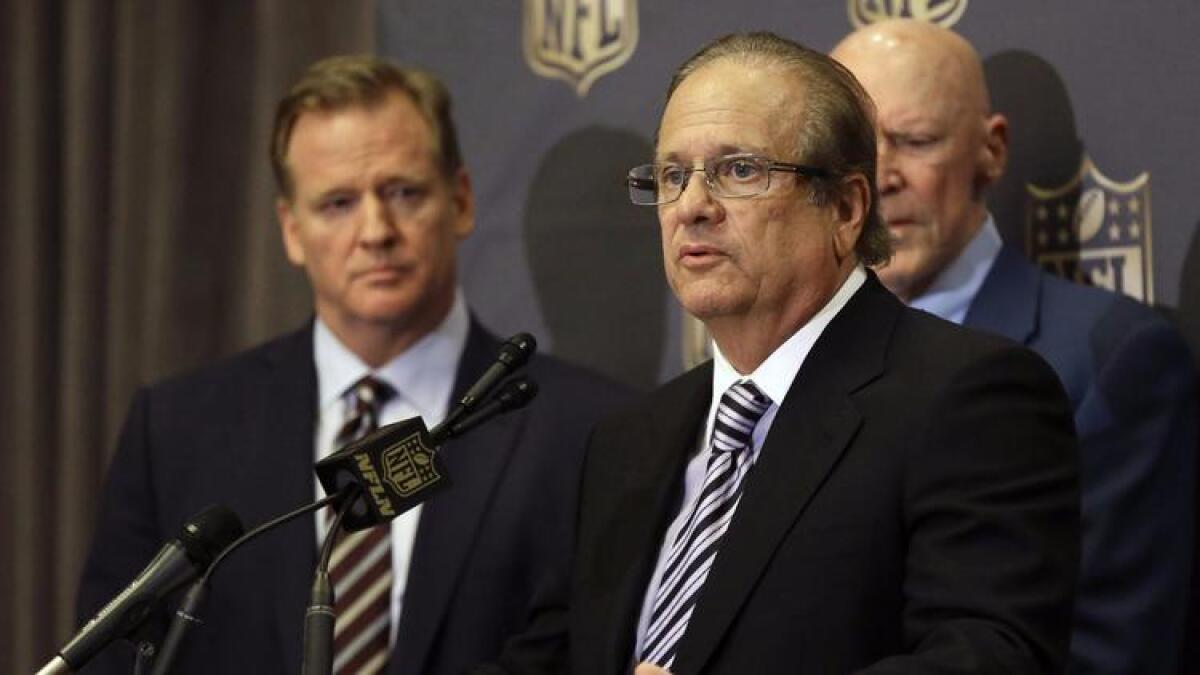 San Diego Chargers owner Dean Spanos talks to the media last year, with NFL Commissioner Roger Goodell looking on.