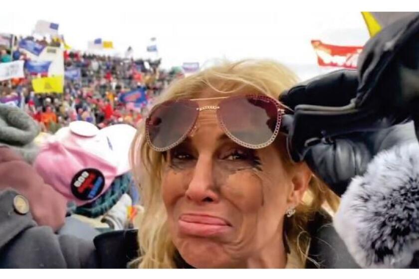 Gina Bisignano, owner of a Beverly Hills eyelashes and skin care salon, at the U.S. Capitol riot on Jan. 6.