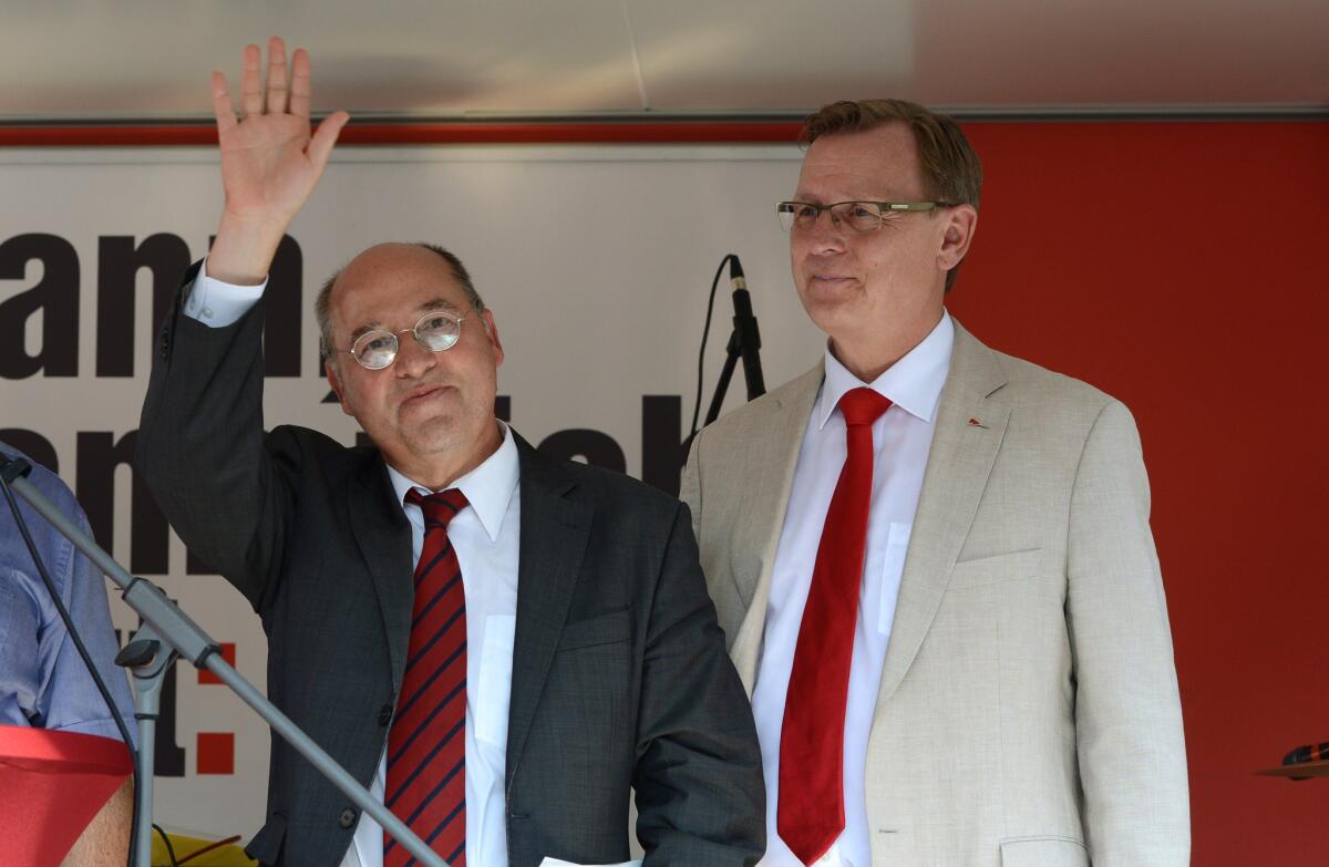 Gregor Gysi, left, of the socialist Left Party with candidate Bodo Ramelow at an election campaign event in September in Weimar, Germany.