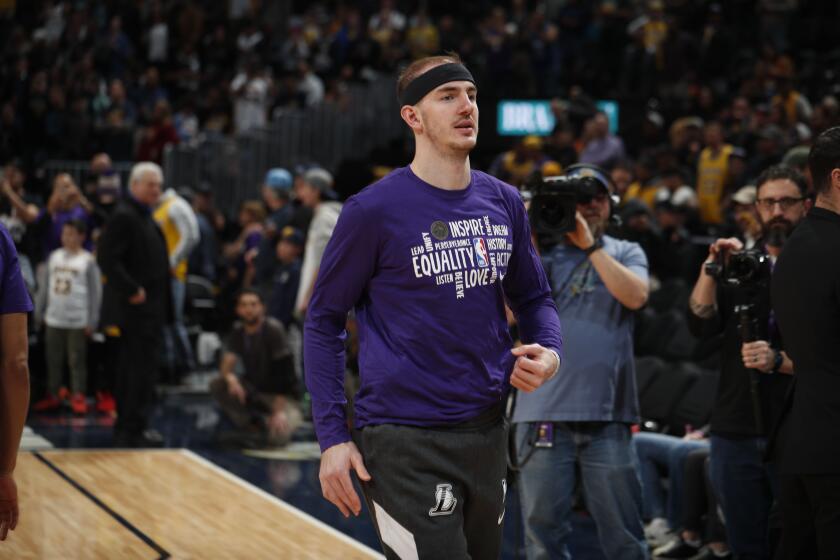 Los Angeles Lakers guard Alex Caruso (4) in the first half of an NBA basketball game Wednesday, Feb. 12, 2020, in Denver. (AP Photo/David Zalubowski)