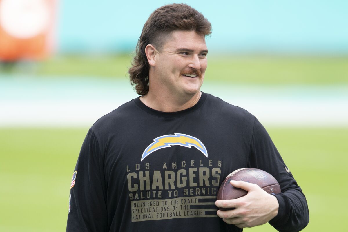 Chargers center Dan Feeney warms up before a game against the Miami Dolphins on Nov. 15.