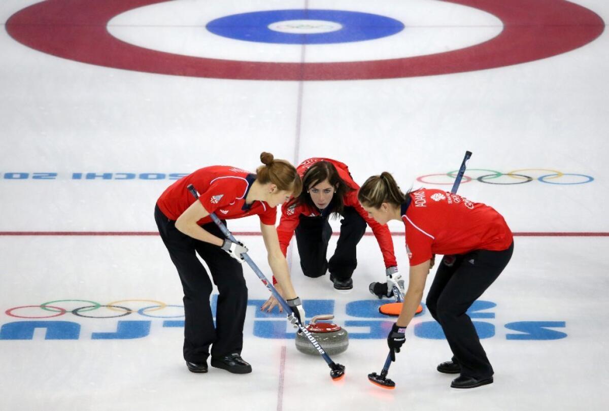 Eve Muirhead, center, of Great Britain in action during the match against Japan.