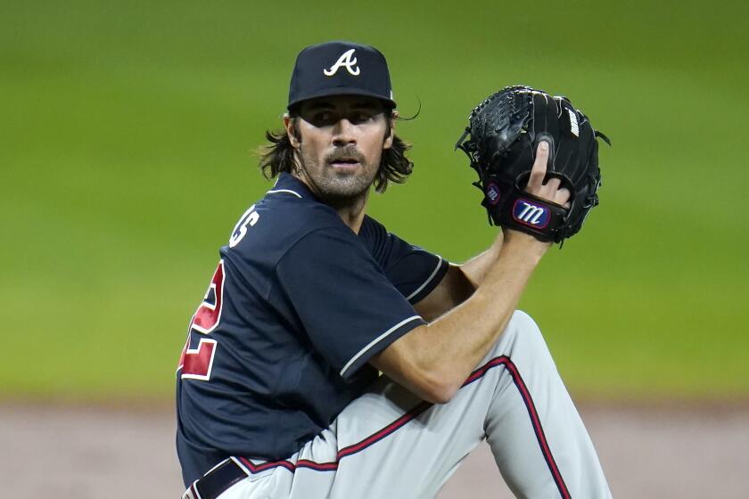 Atlanta Braves starting pitcher Cole Hamels throws a pitch to the Baltimore Orioles during the second inning of a baseball game, Wednesday, Sept. 16, 2020, in Baltimore. (AP Photo/Julio Cortez)