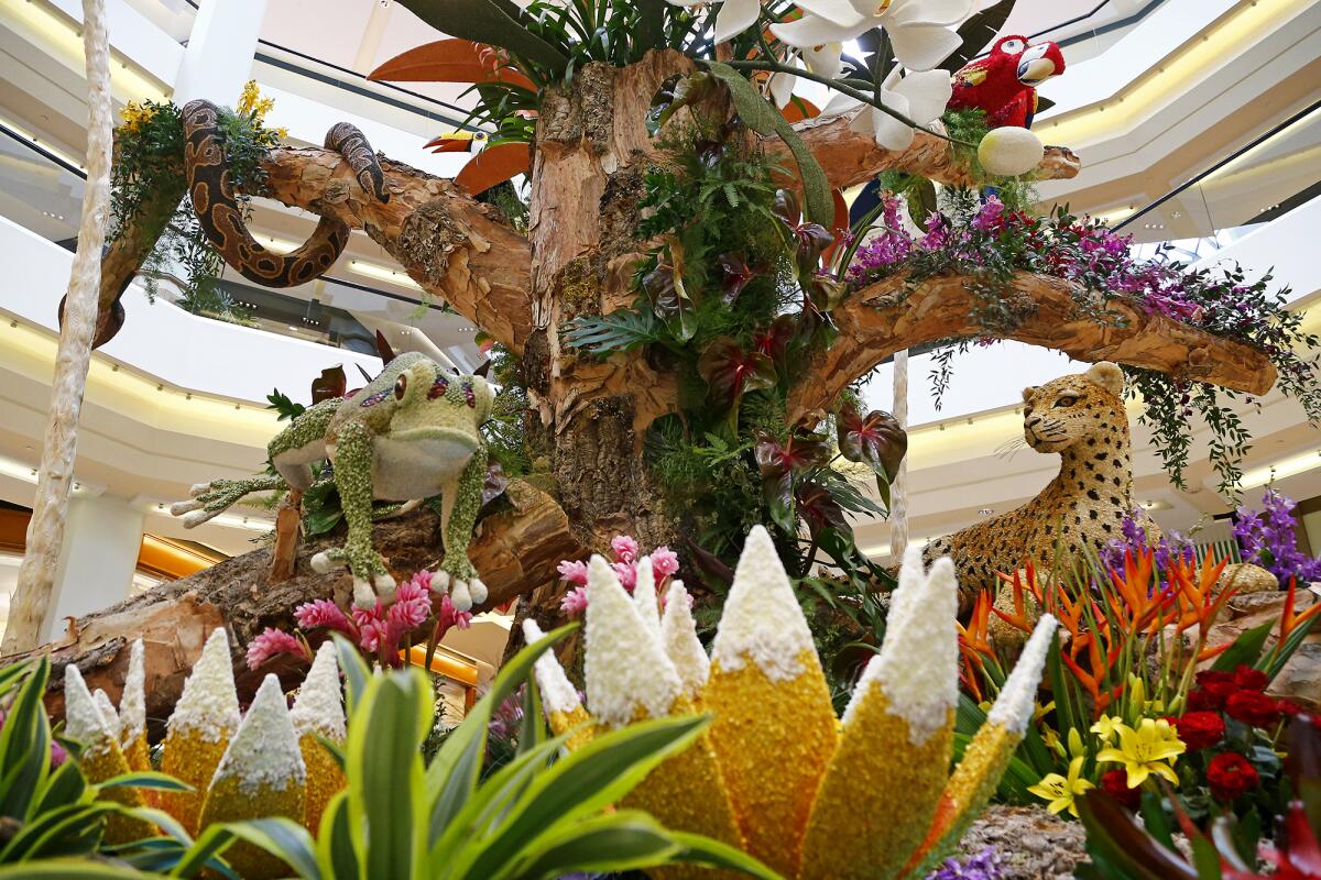 A two-story rainforest-inspired display at South Coast Plaza's "Home in the Garden" in Costa Mesa Friday, April 23, 2021. 
