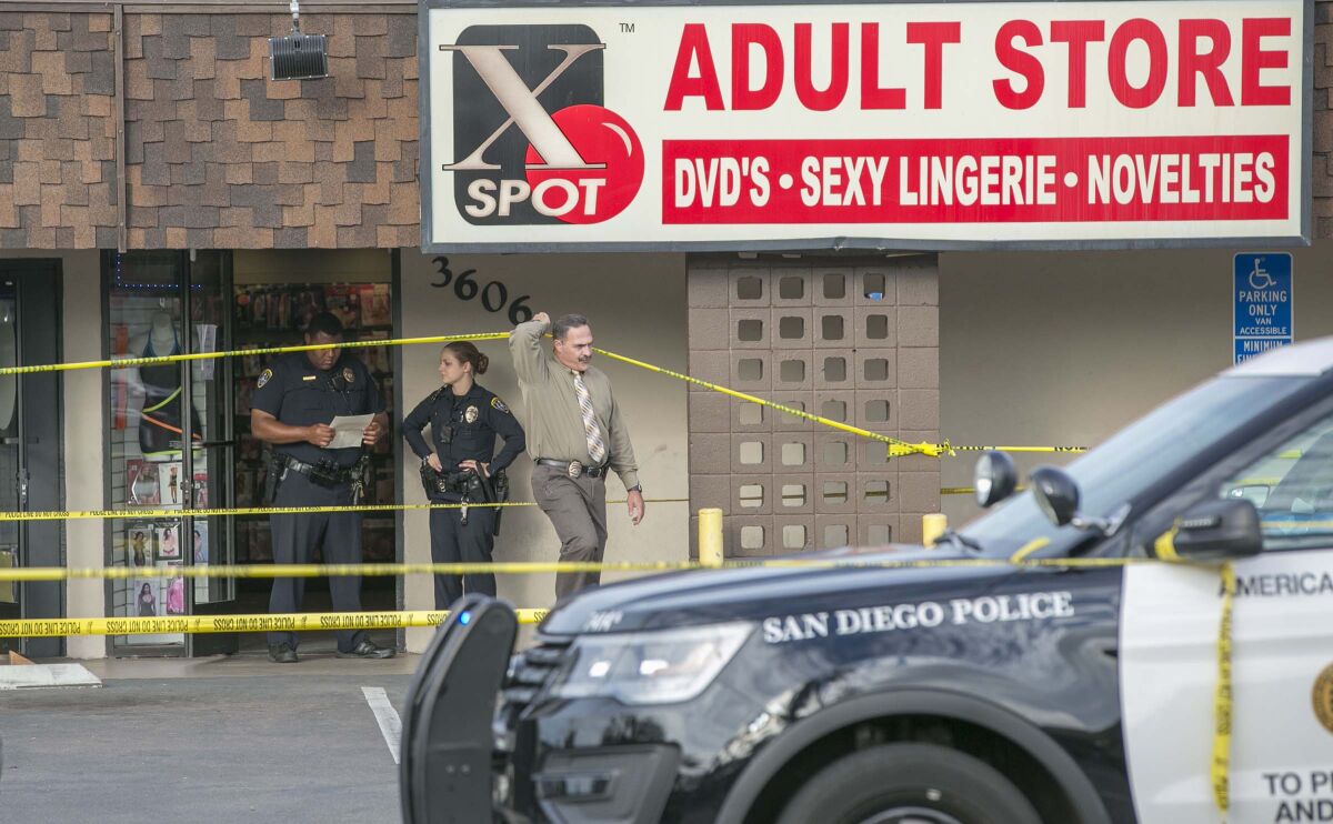 San Diego police investigate fatal stabbing in October 2018 at the X Spot Adult Store on Midway Drive.