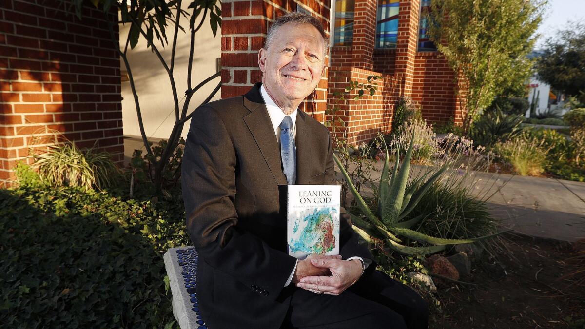Retired judge and La Cañada resident Ralph Zarefsky with the book he recently published, "Leaning on God: Sermons of Rabbi Carole L. Meyers." The book compiles sermons written by his former wife, who served at Temple Sinai of Glendale from 1986 to 2001.