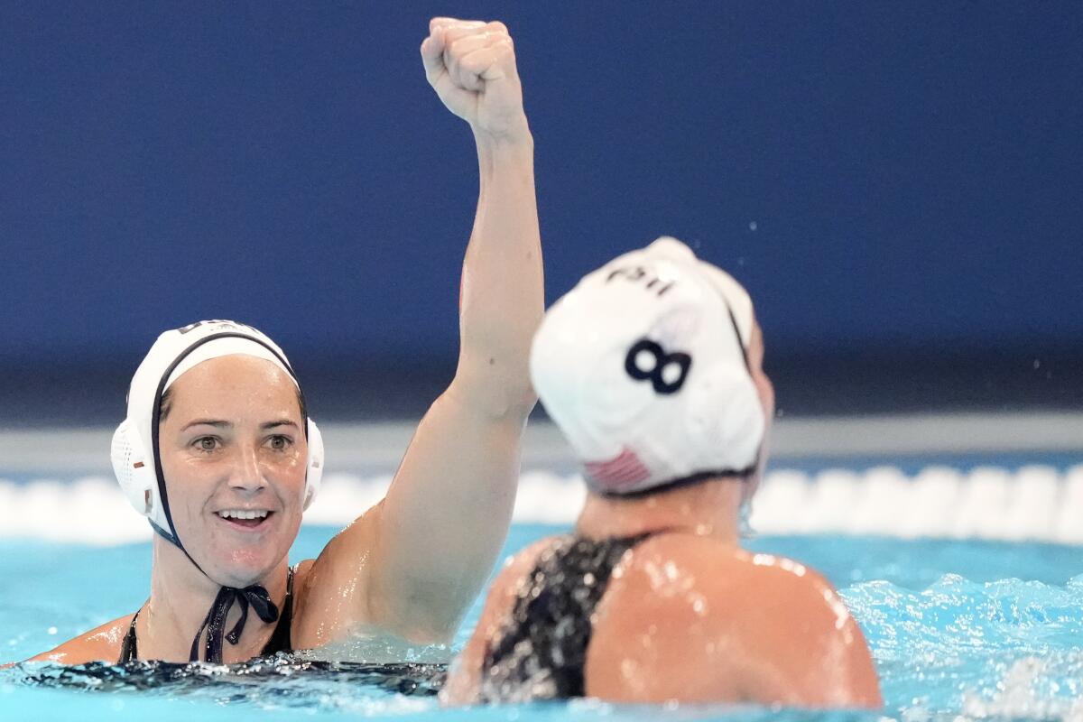 Maggie Steffens, left, celebrates after scoring for the U.S. against Hungary in the World Aquatics Championships.