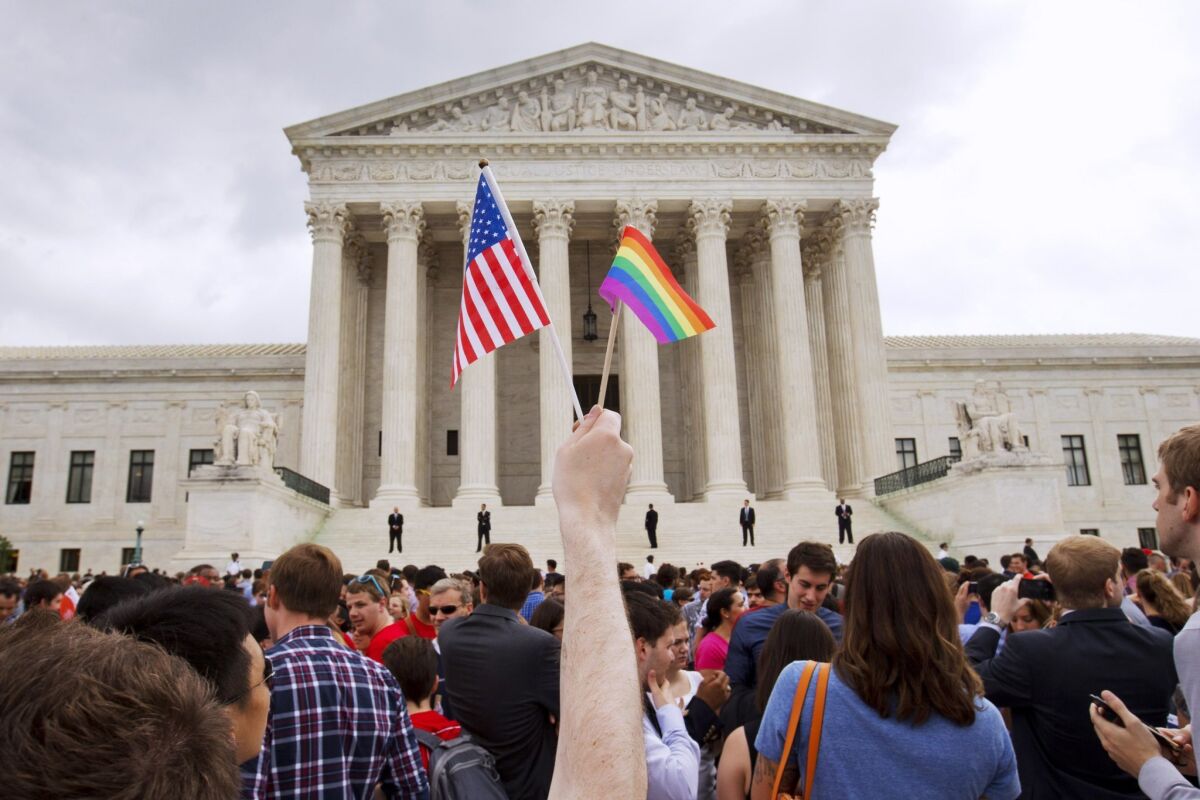 Crowds gather outside the Supreme Court in Washington on June 26 after the court legalized gay marriage nationwide. After the decision, religious conservatives are focusing on preserving their right to object.