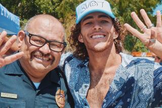 Skater Blake Sterger, with San Diego Police Department Sgt. Sal Hurtado, broke the record for most continuous laps at last year's Skate Jam.