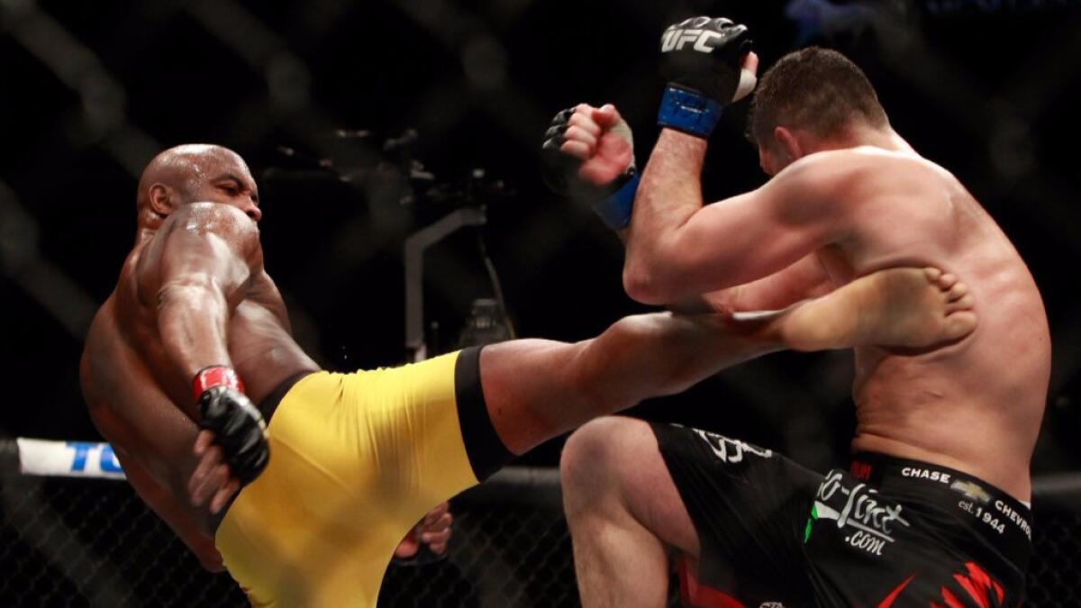 Anderson Silva kicks Nick Diaz in their middleweight bout during UFC 183 in Las Vegas on Jan. 31, 2015.