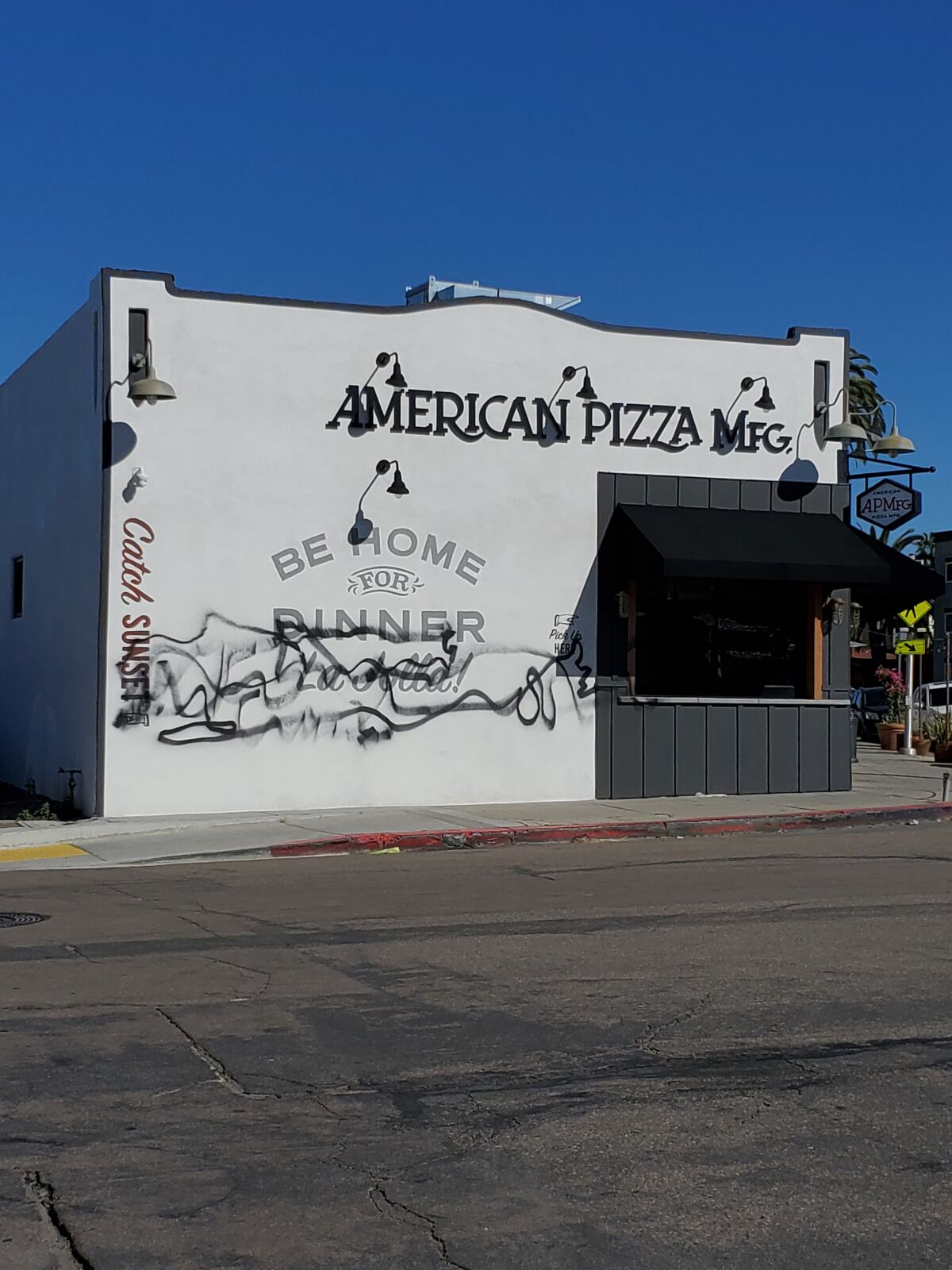 The American Pizza Manufacturing restaurant at 7402 La Jolla Blvd. has been vandalized twice in recent weeks.