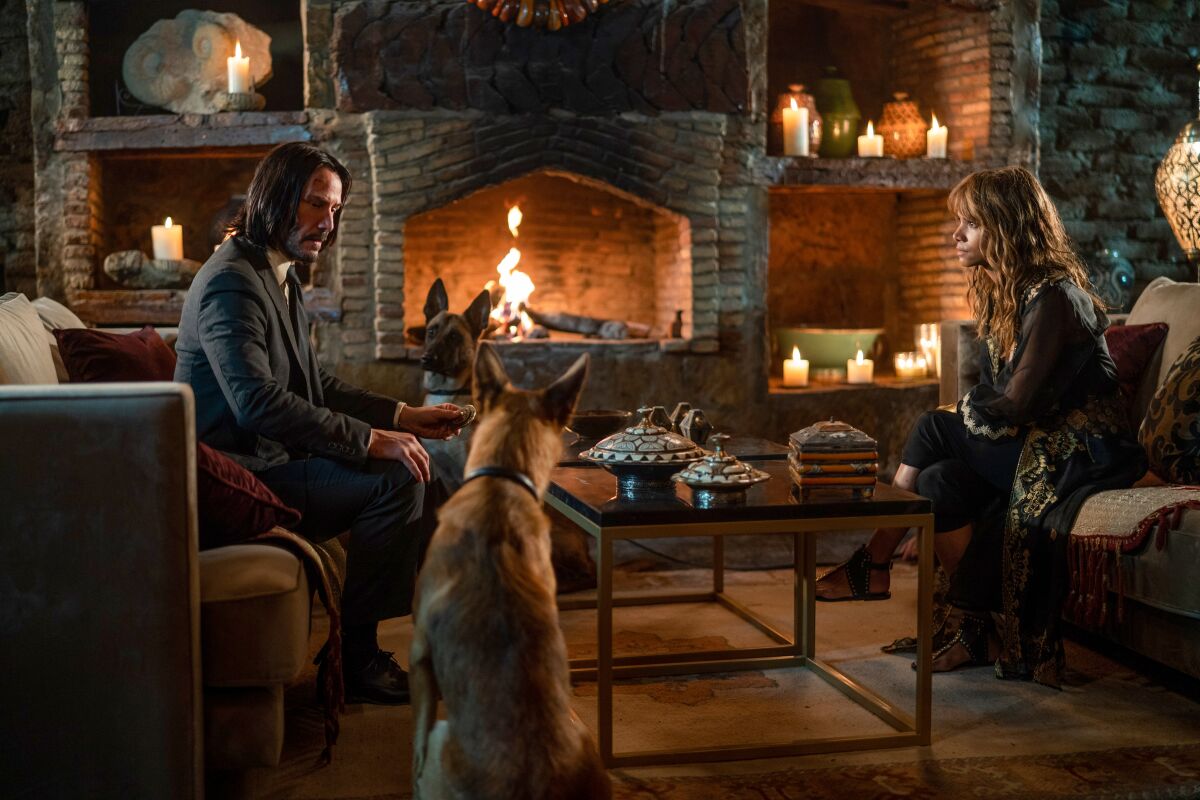 John (Keanu Reeves) and Sofia (Halle Berry) in “John Wick: Chapter 3 — Parabellum.”