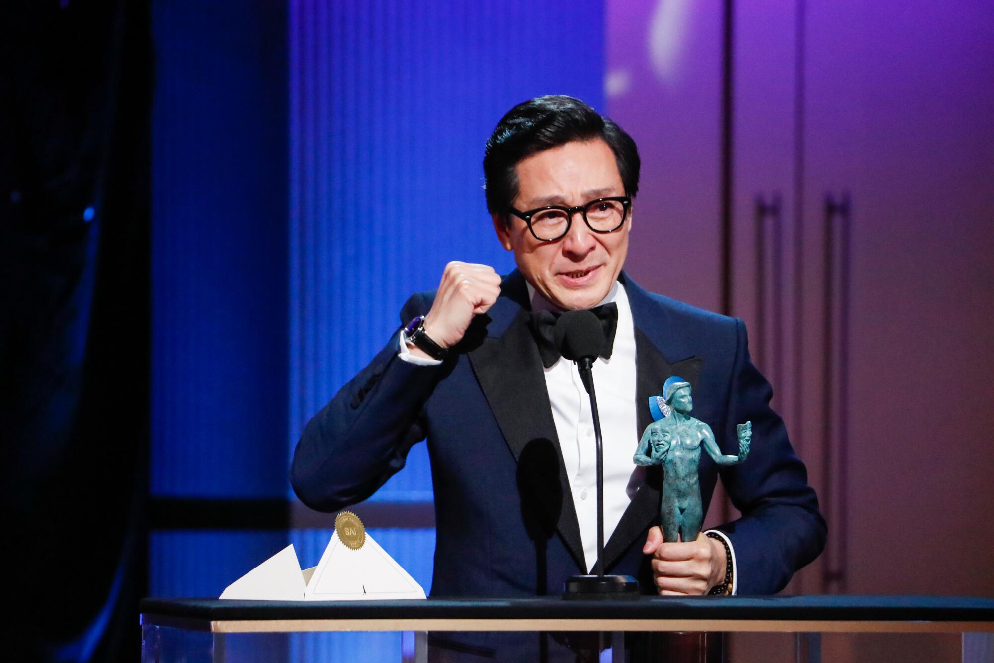 Ke Huy Quan accepts the award for male actor in a supporting role for "Everything Everywhere All at Once."